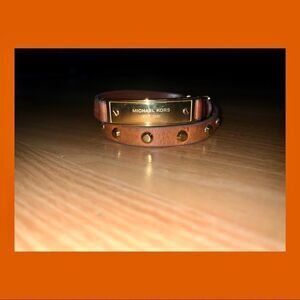 MICHAEL KORS Brown and Gold Wrap Bracelet MICHAEL KORS Brown and Gold Br…